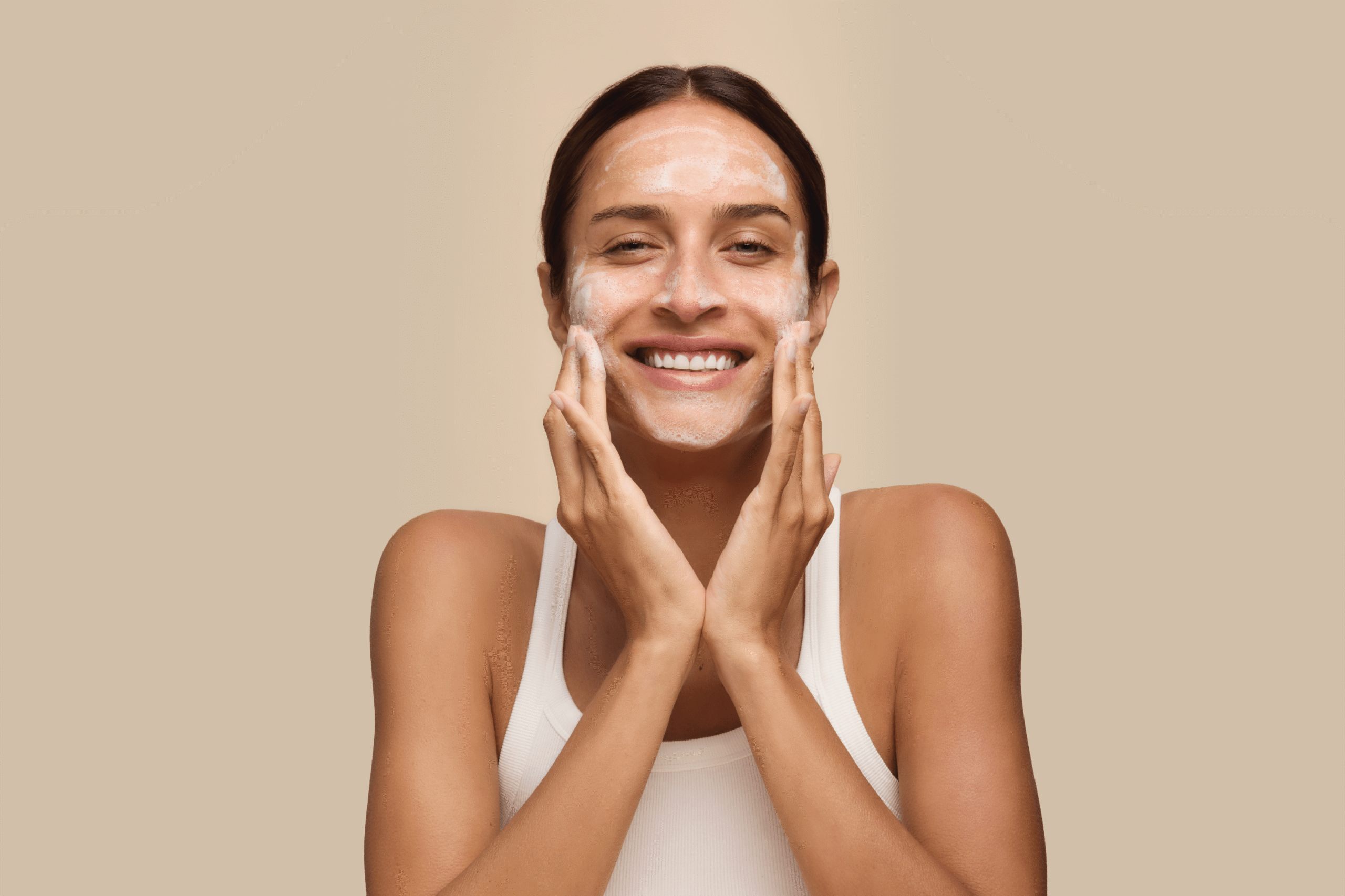 Woman using Ultraceuticals for. her Brightening Skincare Routine